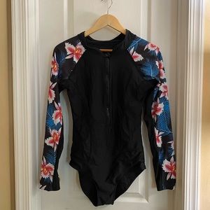 Black tropical print long sleeve surf suit one piece gently used size unknown